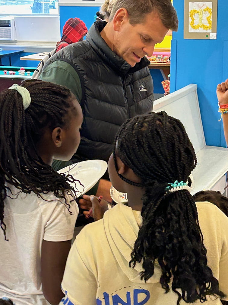 Mike Simonds speaking with members of the Boys and Girls Club of Southern Maine