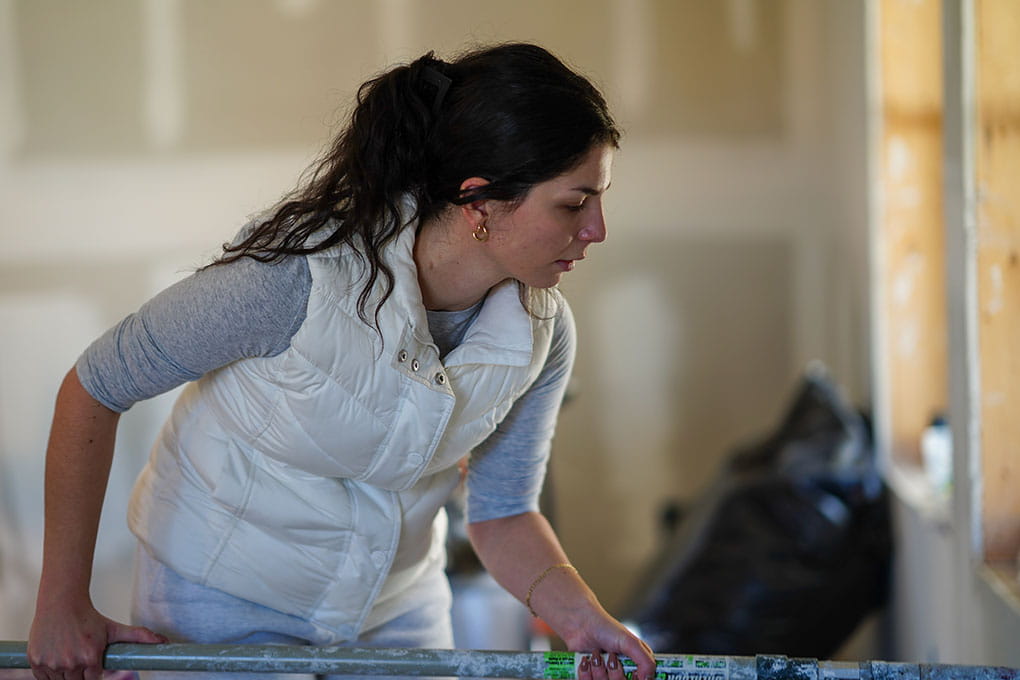 Unum Group employee painting at community event