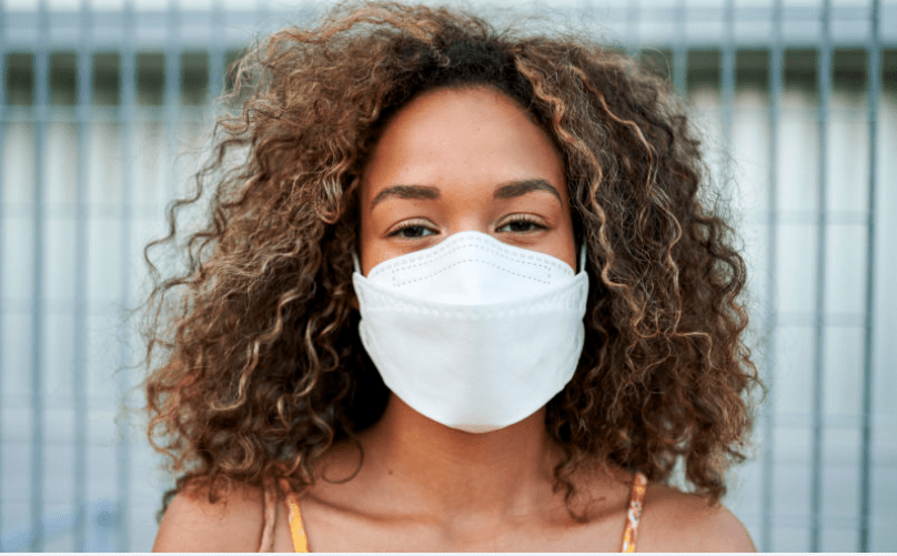 Young woman with mask